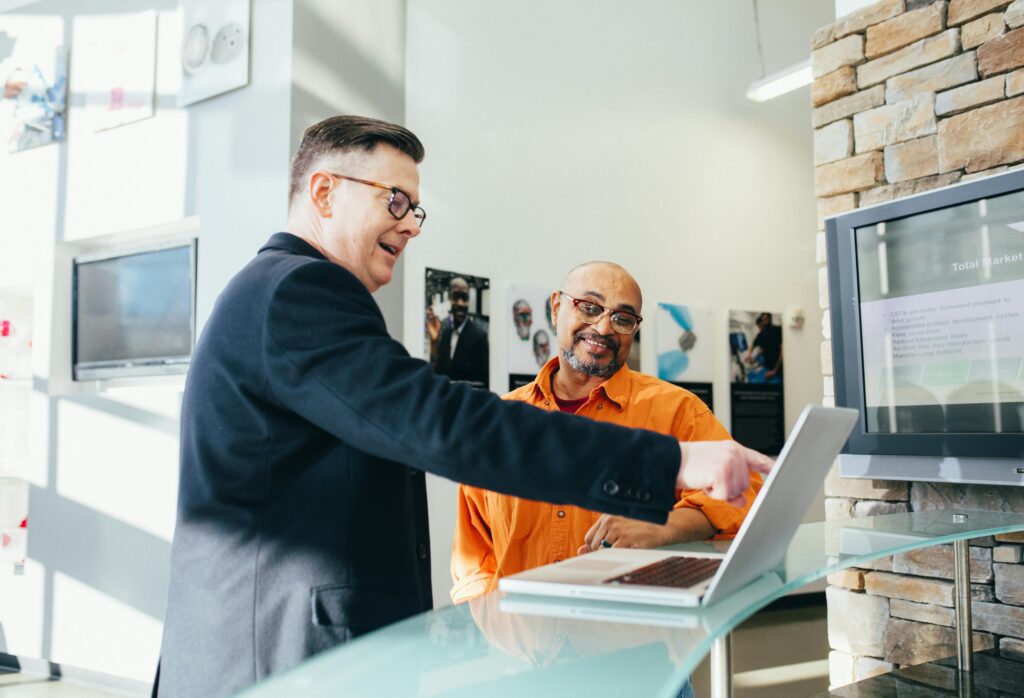 Man Pointing Laptop Computer